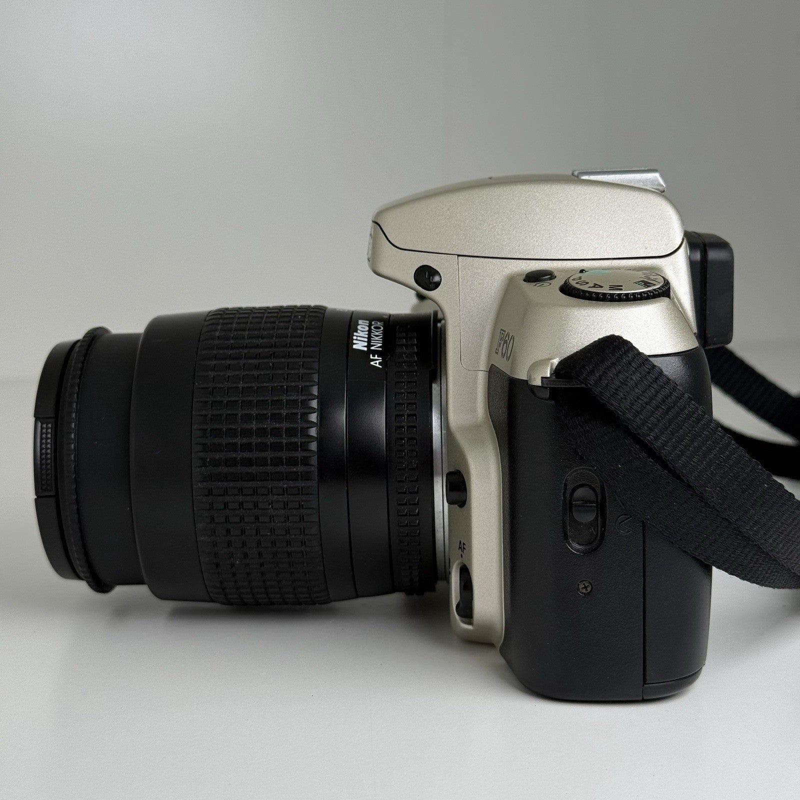 Nikon F60 35mm Gold Film Camera + Nikon 35-80mm Lens